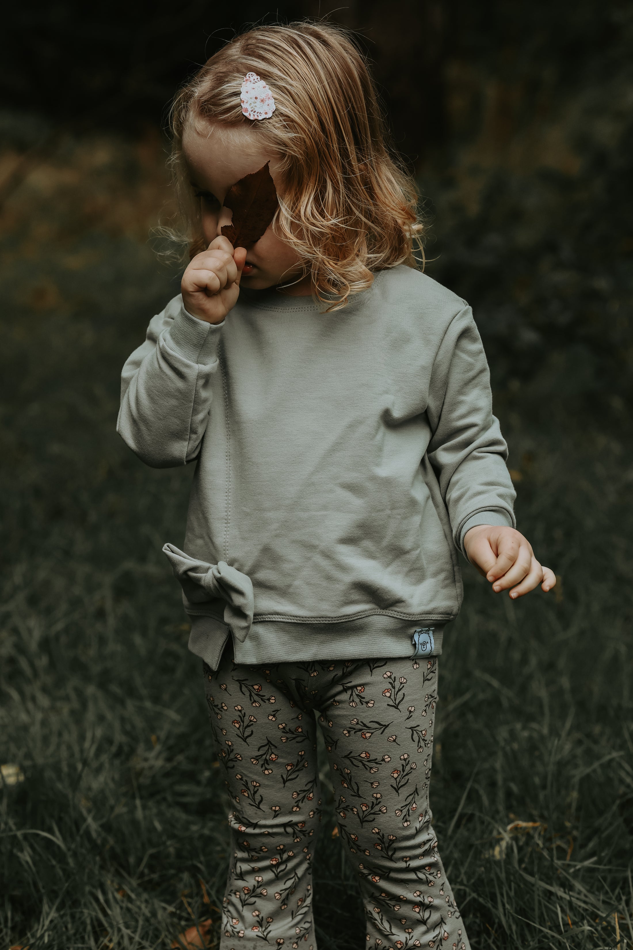 Handmade sweater oudgroen met strikdetail