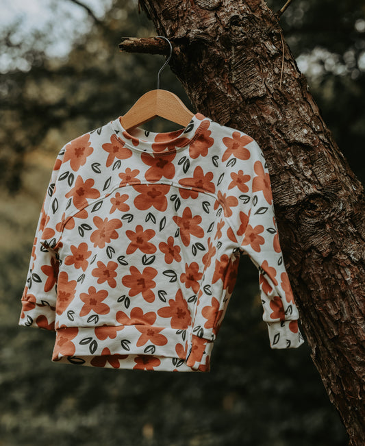 Sweater Nina – kindertrui met rood/roze bloemenprint