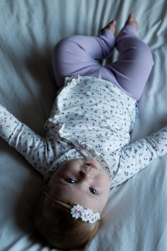 Handmade overslag newborn met ruffle en bloemetjesprint