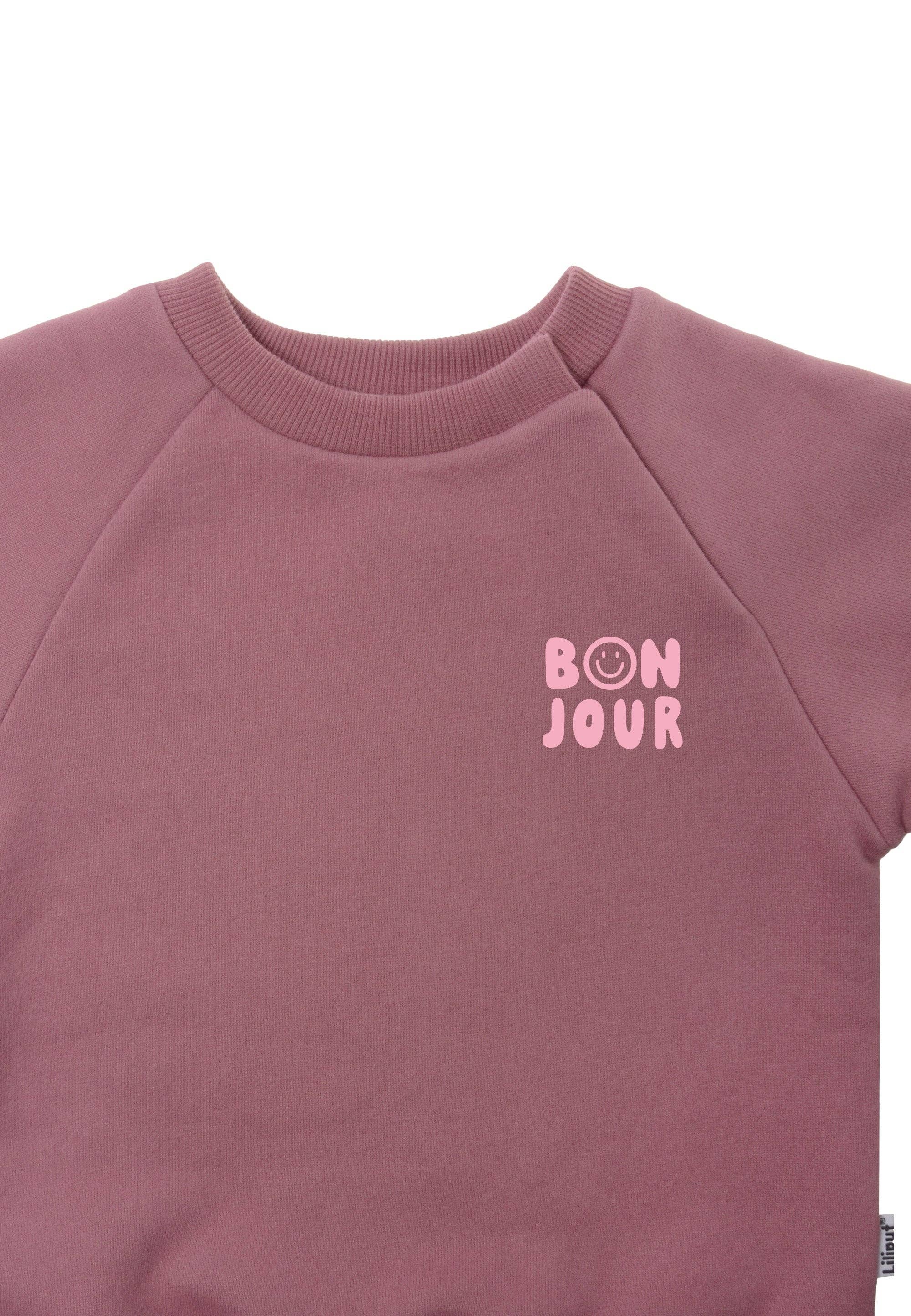 Liliput “Bonjour” trui met subtiele smiley chest print