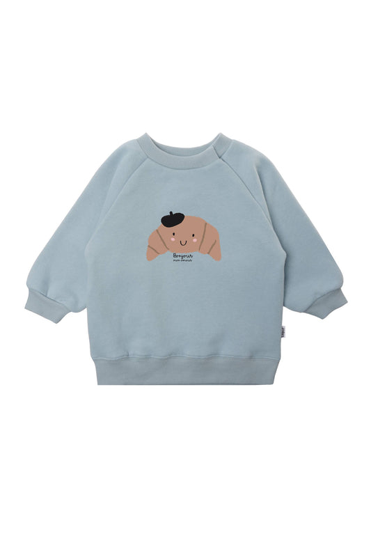 Liliput sweater Bonjour Croissant in lichtblauw met croissantprint